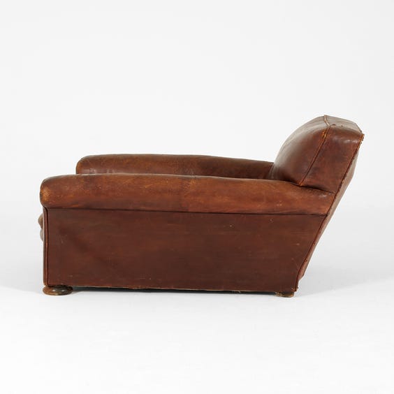 image of Vintage brown leather armchair