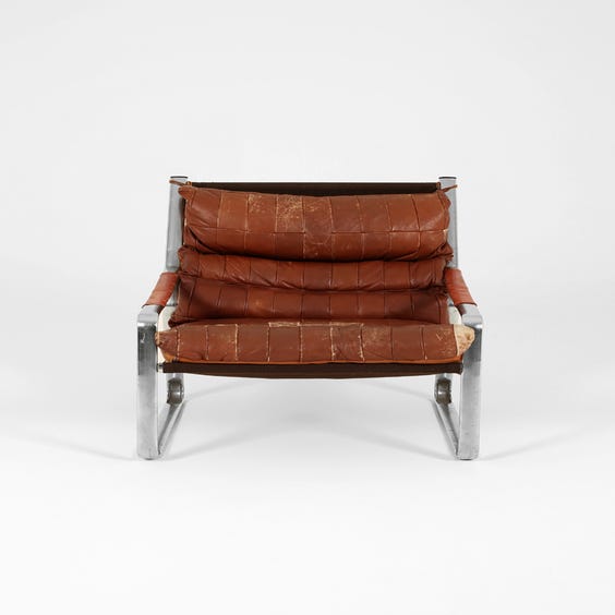 image of Patchwork brown leather armchair