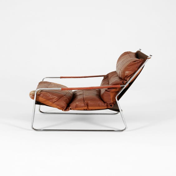 image of Patchwork brown leather armchair