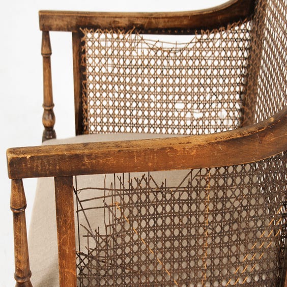image of Vintage rattan armchair linen seat