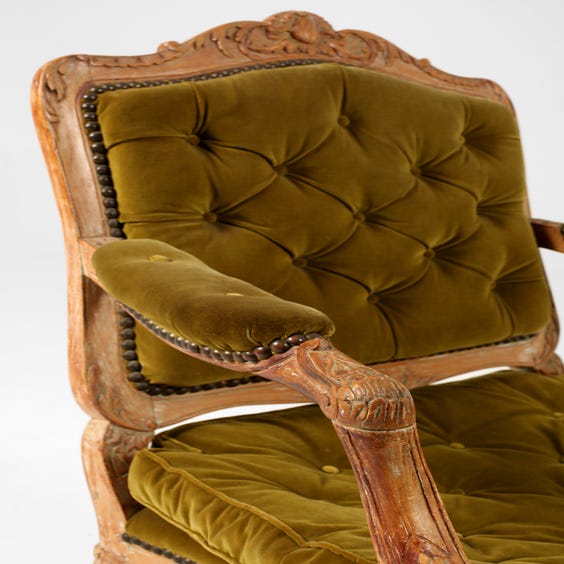 image of Vintage green carved wood armchair