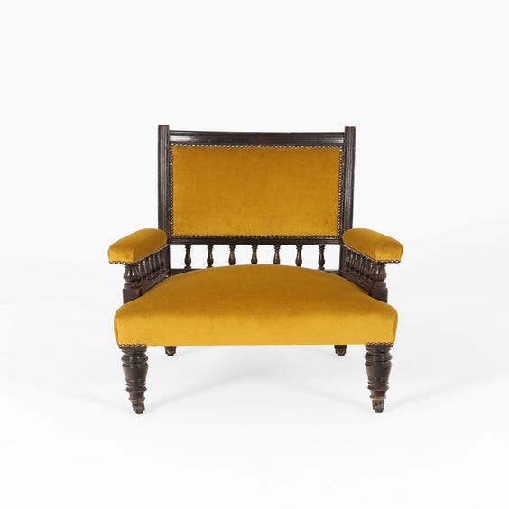 image of Vintage gold velvet spindle armchair