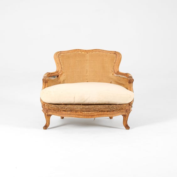 image of Vintage carved unupholstered armchair