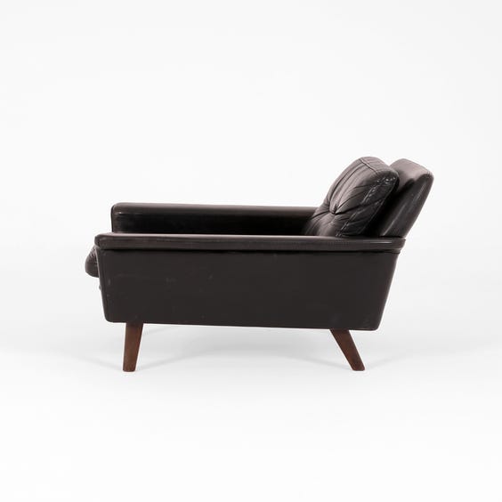 image of Danish black leather armchair