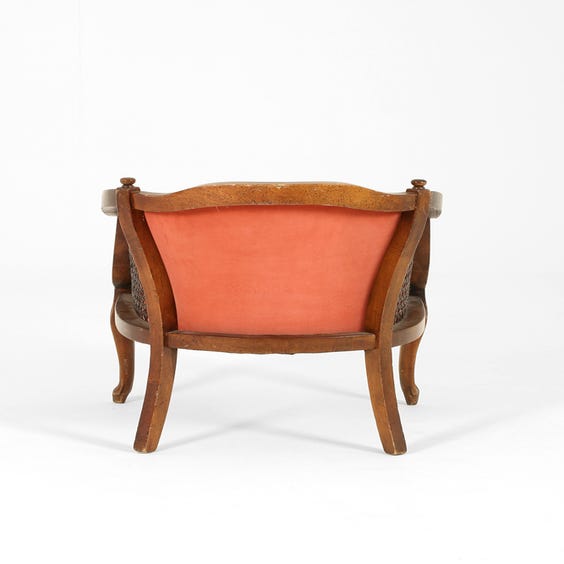 image of Vintage coral velvet rattan armchair