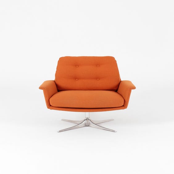 image of Midcentury pumpkin orange armchair