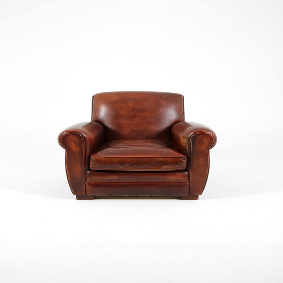 image of Traditional brown leather armchair
