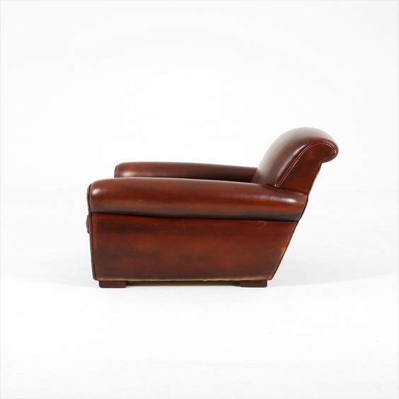 image of Traditional brown leather armchair