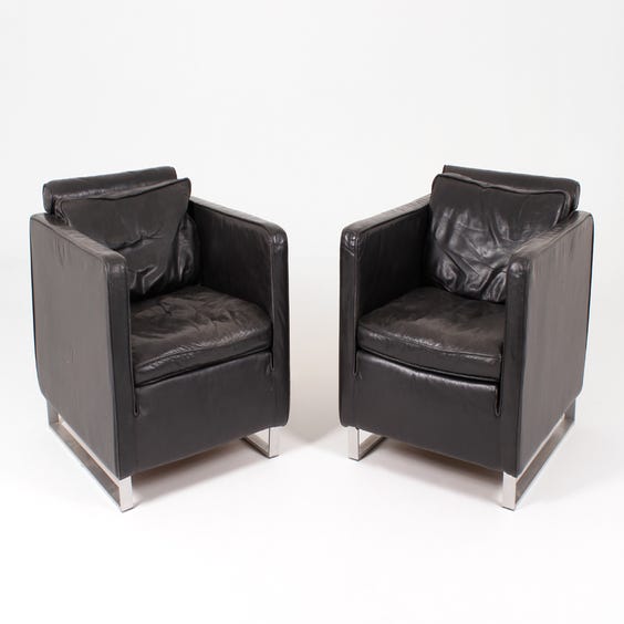 image of Vintage black age leather armchair