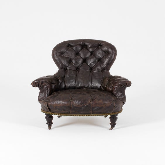 image of Period black buttoned leather armchair