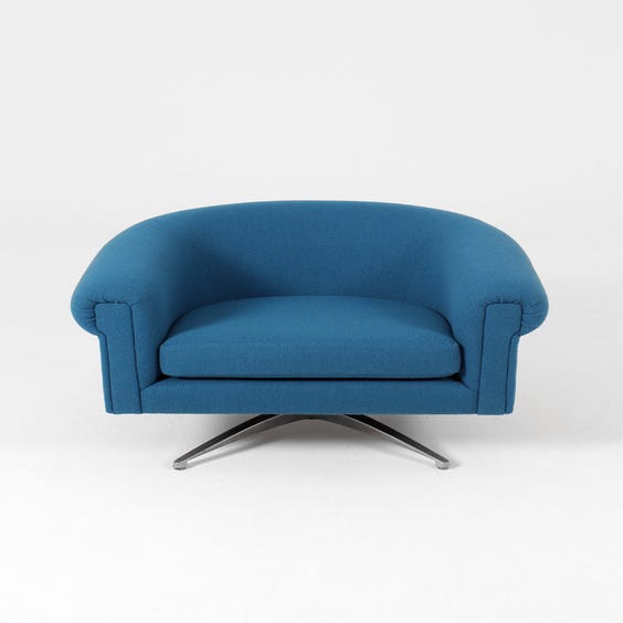 image of Petrol blue wool swivel tub chair