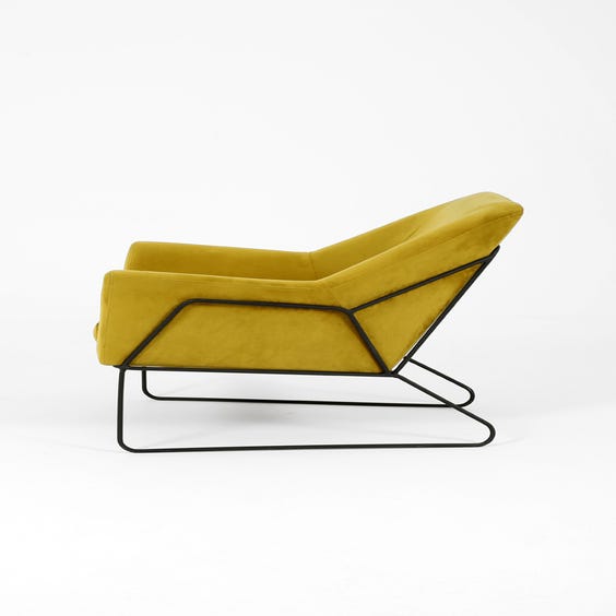 image of Midcentury green velvet lounge chair