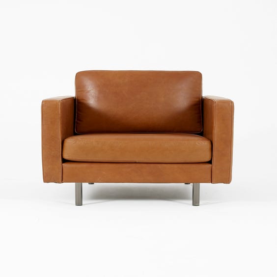 image of Tan leather armchair