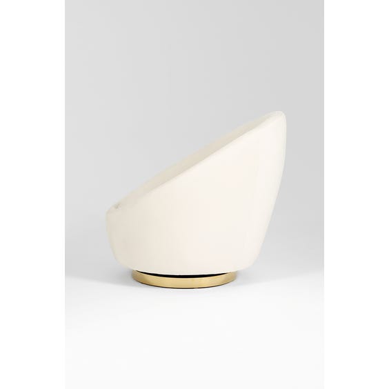image of Off white swivel tub armchair