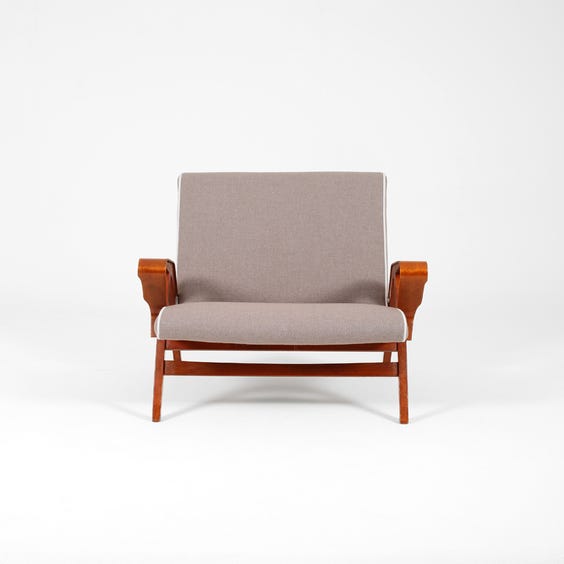 image of Midcentury muted mauve armchair