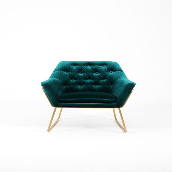 image of Peacock blue velvet lounge chair