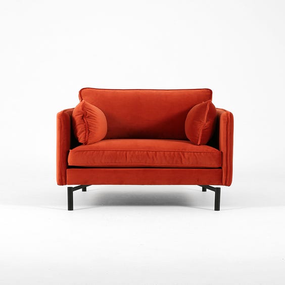 image of Rust red velvet armchair