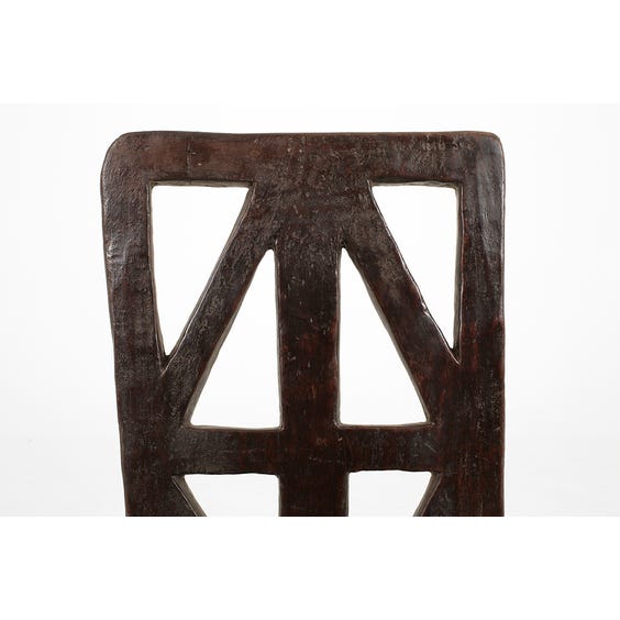 image of Primitive carved dark wood chair