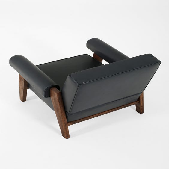 image of Midcentury muted navy blue armchair