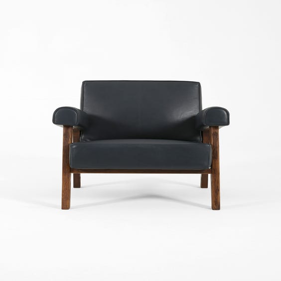 image of Midcentury muted navy blue armchair