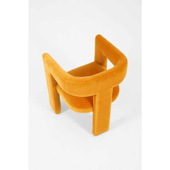 image of Yellow velvet sculptural armchair