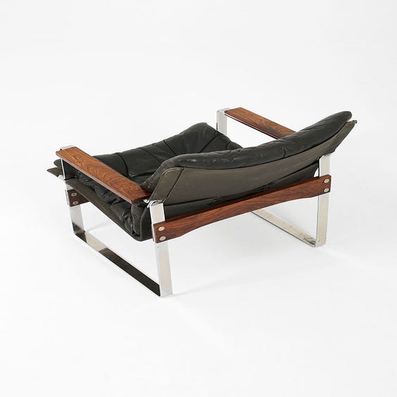 image of Midcentury chrome and leather lounge chair