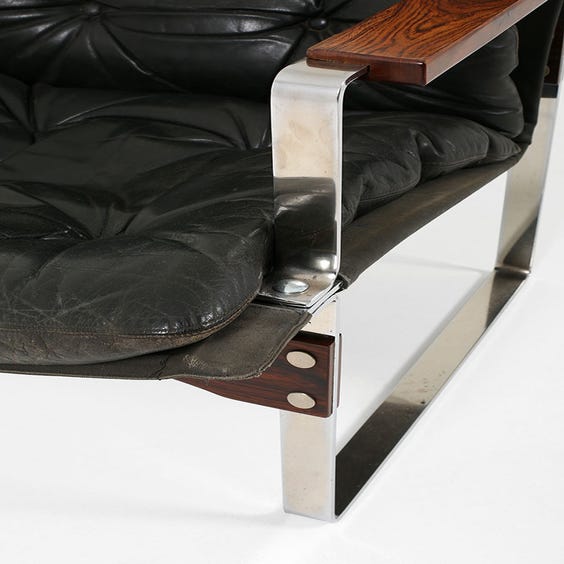 image of Midcentury chrome and leather lounge chair