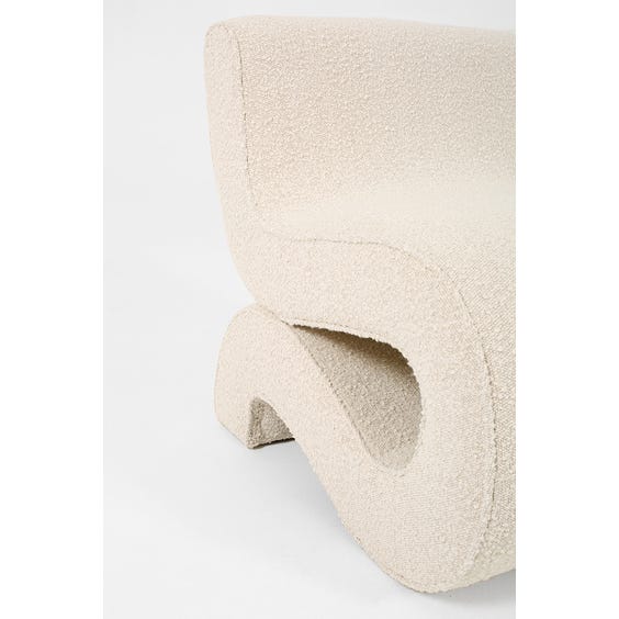 image of Postmodern off white boucle s-shaped lounge chair