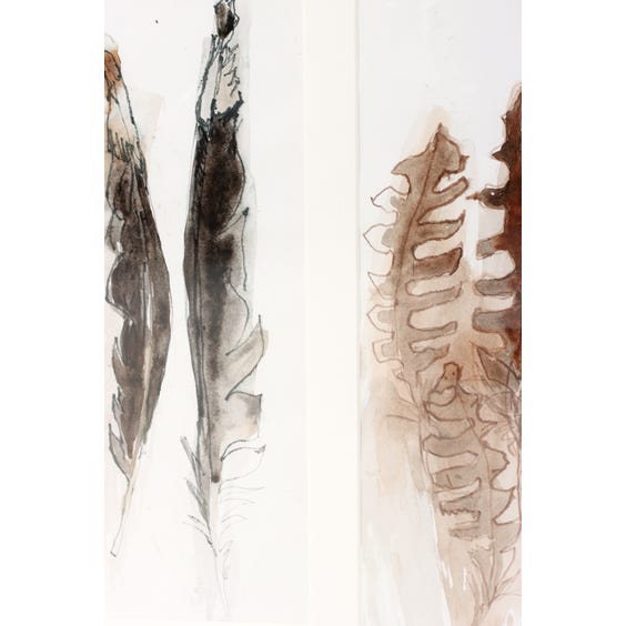 image of White mounted grey and brown painted feathers