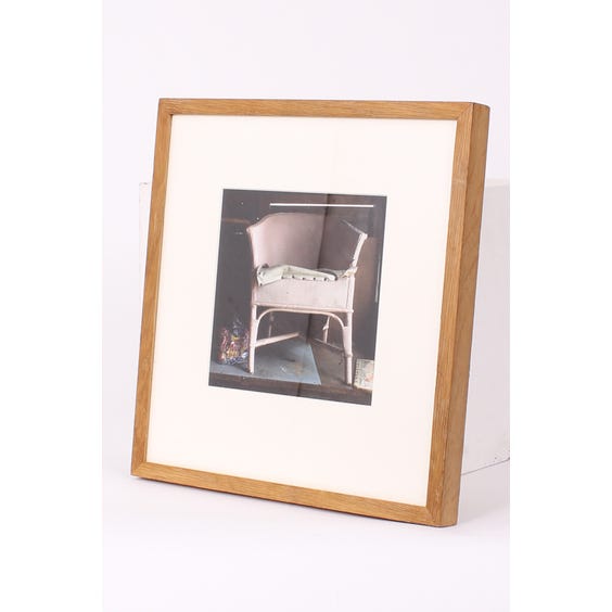 image of Photograph of pink raffia chair