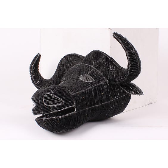 image of Black beaded African buffalo head