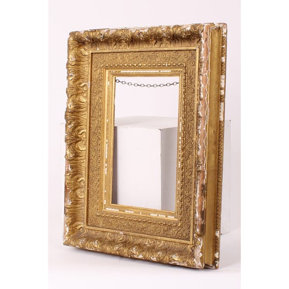 image of Ornate gold gilt empty frame