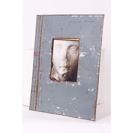 image of Stone statue grey metal frame