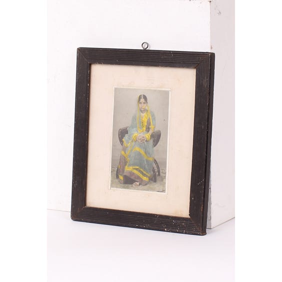 image of Indian woman in blue sari painting