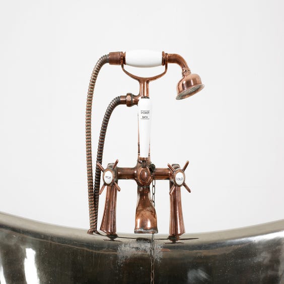 image of Hammered copper free standing boat bath
