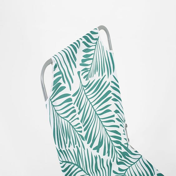 image of 1970's style green leaf pattern sun lounger