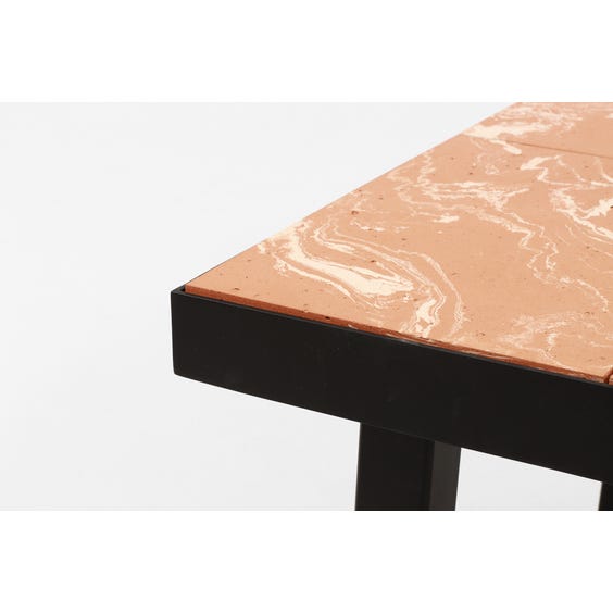 image of Low terracotta tiled coffee table