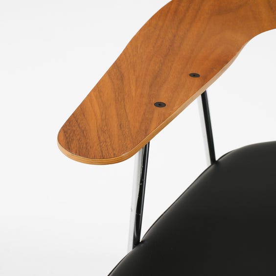 image of Robin Day black leather chair