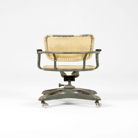 image of Industrial woven yellow metal chair
