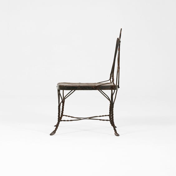 image of Rustic metal twisted wire chair