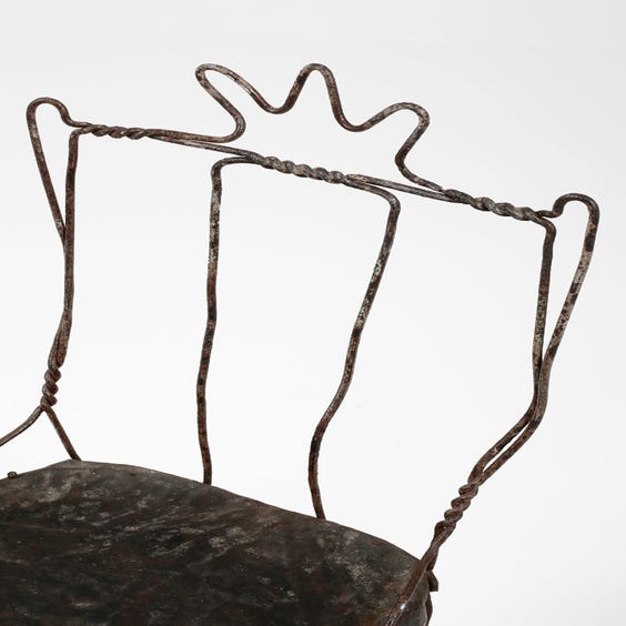 image of Rustic metal twisted wire chair