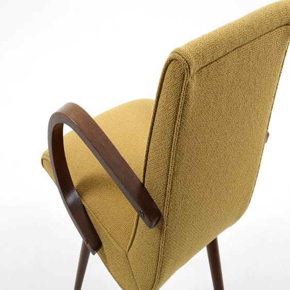 image of Midcentury mustard loop arm chair