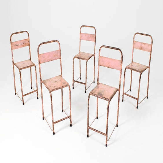 image of Assorted worn pink metal canteen chair