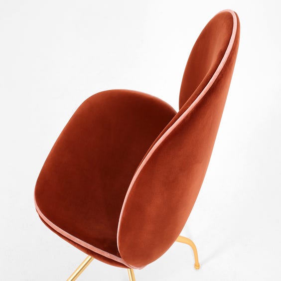 image of Beetle swivel rust velvet chair