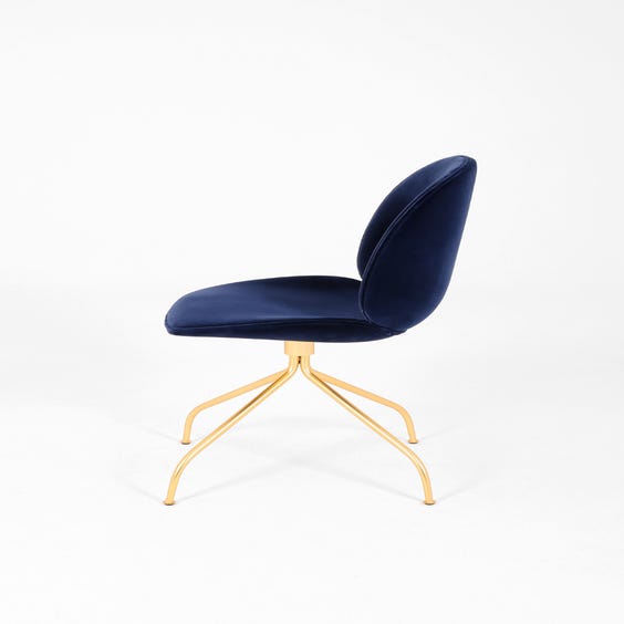 image of Beetle swivel blue velvet chair