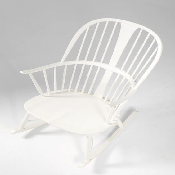 image of White spindle back rocking chair