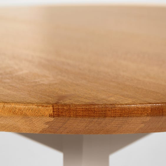 image of Circular oak top dining table