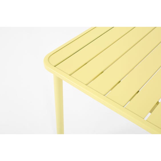 image of Modern dusky yellow metal garden dining table