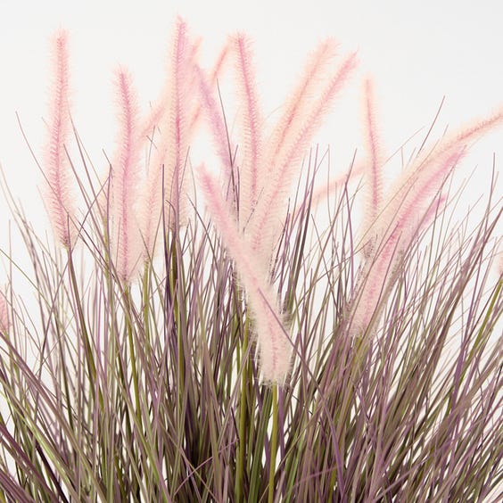 image of Artificial rush plant with pink flower