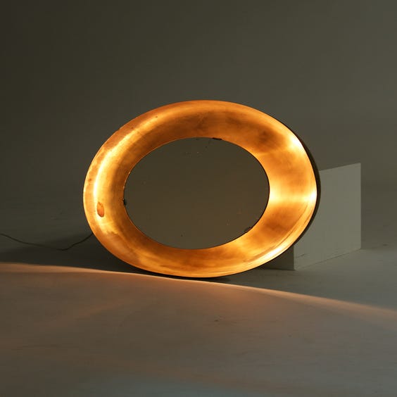 image of Circular gold metal wall light